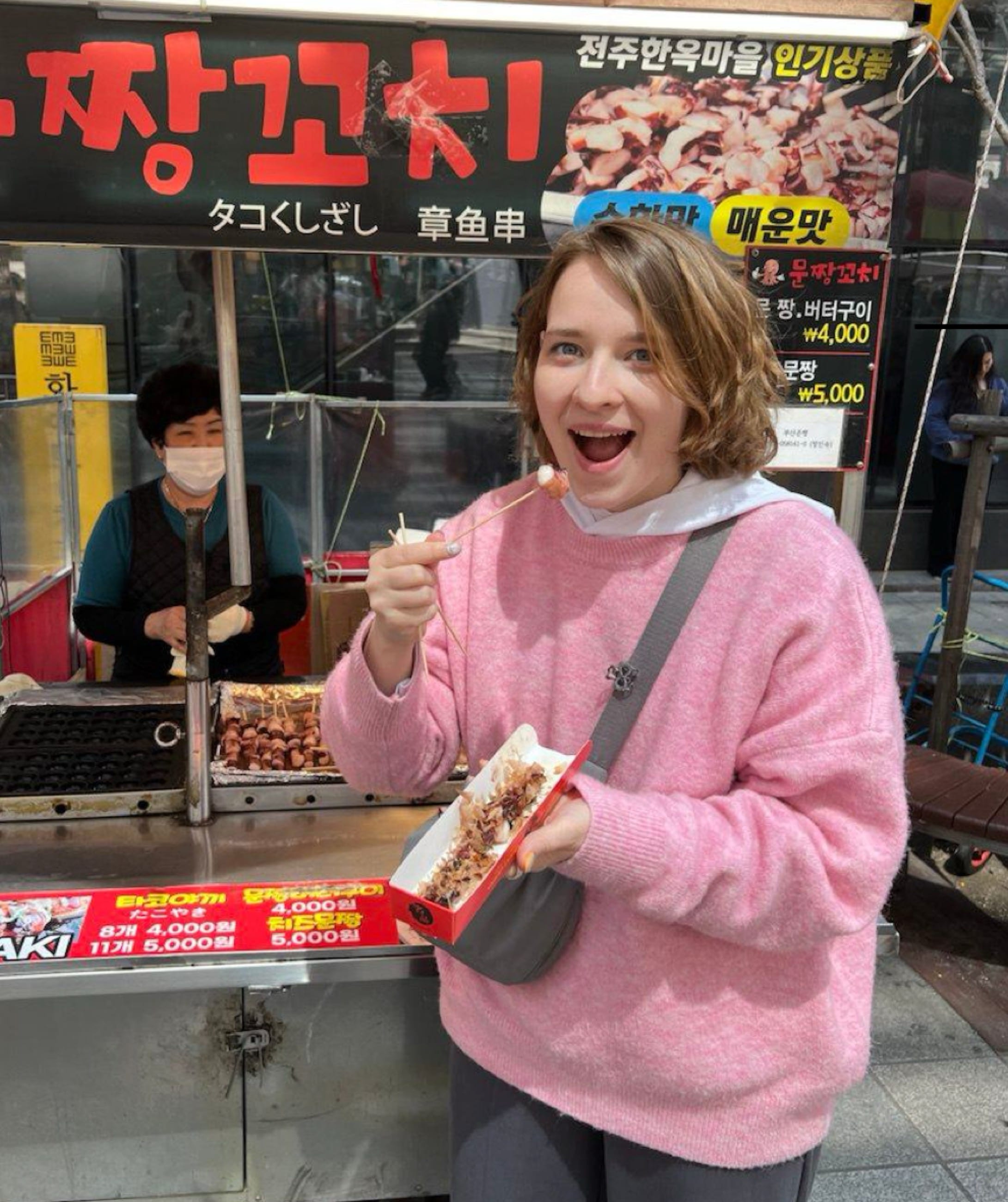 Daria Sharenkova at a street market in Seoul